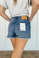 High Rise Shorts With Fray Hem And Distressing
